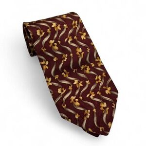 Designer Silk Burgundy necktie featuring yellow/gold floral pattern.